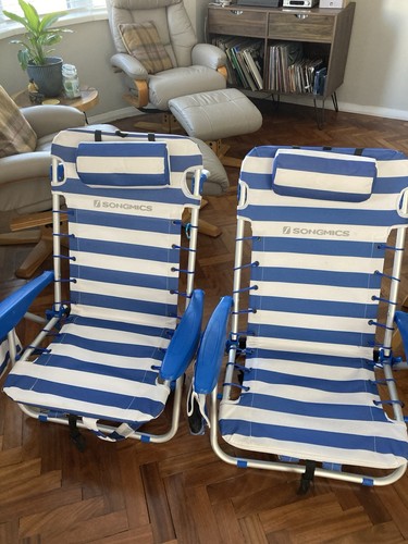 Set beach chairs for - of,